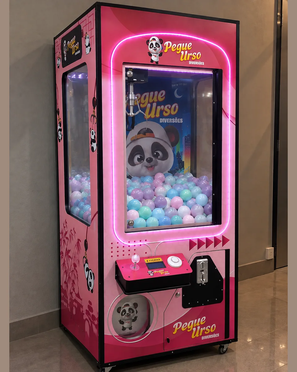 Máquina de garra rosa em um evento